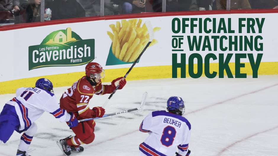 Hockey action on ice beside a Cavendish Farms rink board promoting “Official Fry of Watching Hockey.”